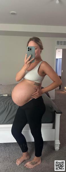 Peek a boo with my 7 months pregnant belly